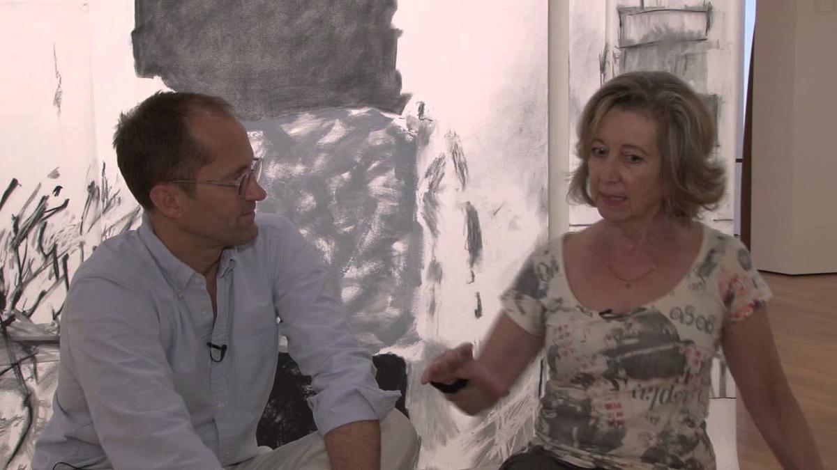 Rocio Rodriguez and Michael Rooks, Curator of Modern and Contemporary art at the High Museum of Art, discuss the wall drawing, 'In and Out'. 